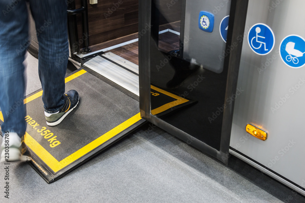 platform for wheelchairs in the cabin of a modern and comfortable city ...