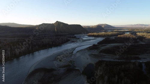 Autumn flight over Abakan river. photo