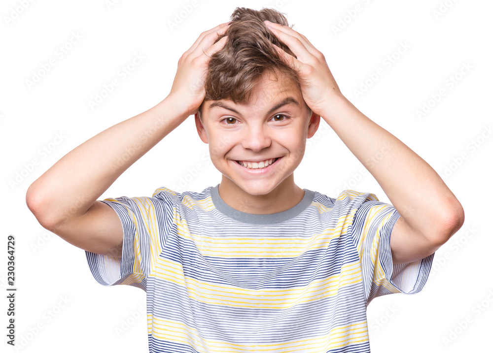Close up emotional portrait of caucasian teen boy. Surprised teenager looking at camera. Handsome happy child, isolated on white background. Close up emotional portrait of caucasian teen boy. Surprised teenager looking at camera. Handsome happy child, isolated on white background.
