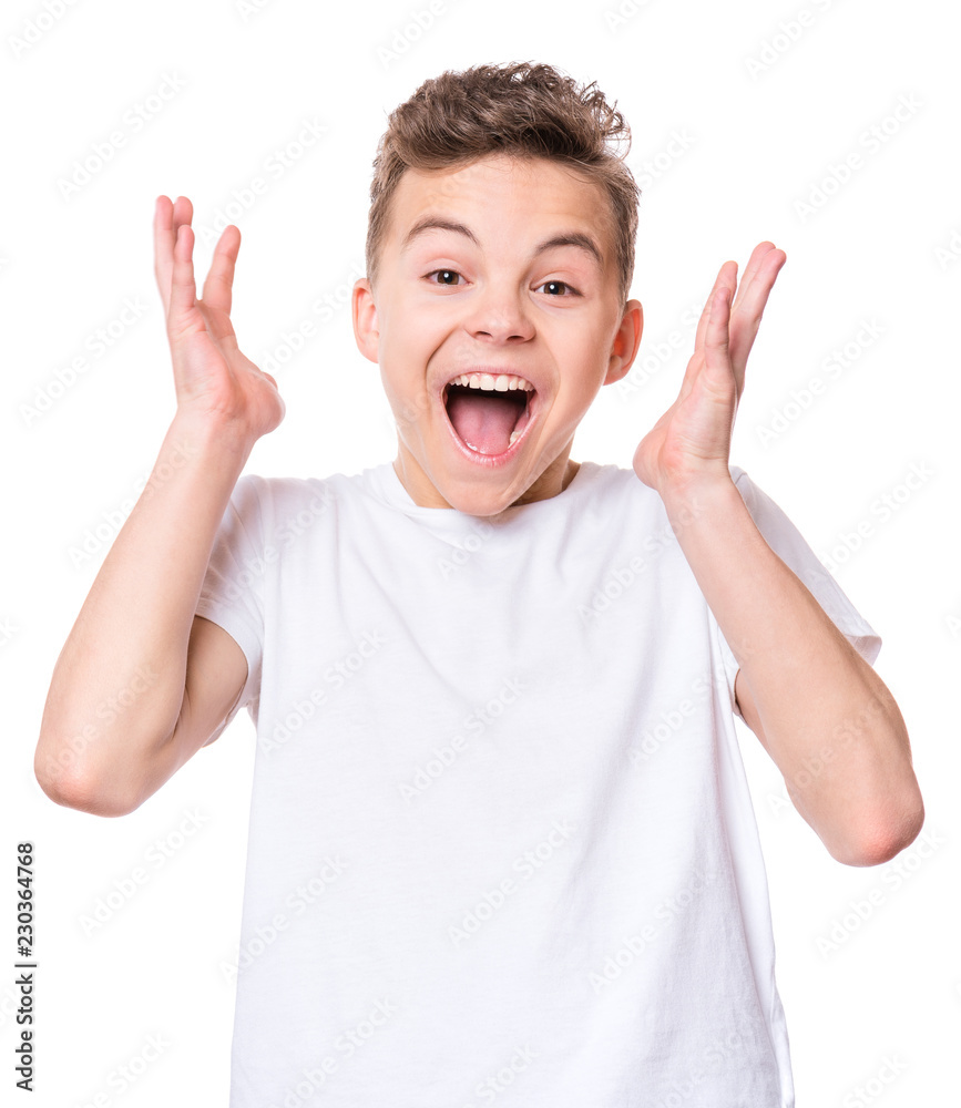 Half-length emotional portrait of caucasian teen boy wearing white t-shirt. Funny surprised teenager isolated on white background. Handsome child looking at camera. Half-length emotional portrait of caucasian teen boy wearing white t-shirt. Funny surprised teenager isolated on white background. Handsome child looking at camera.