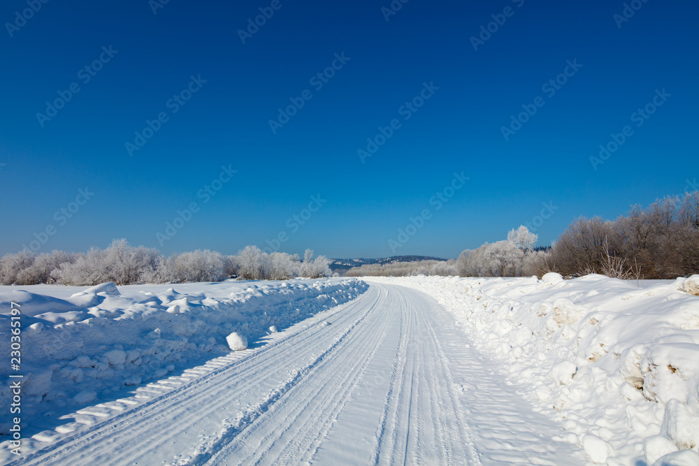 Fototapeta premium winter landscape with road