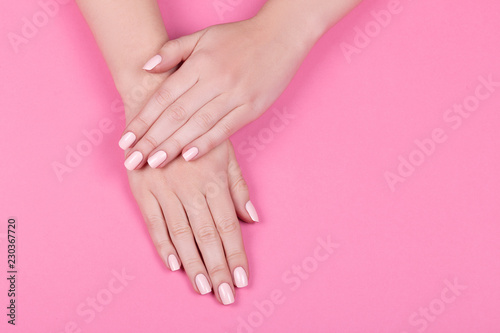 Stylish trendy female pink manicure.