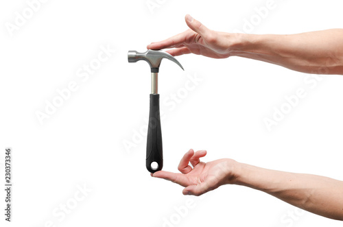 Male hand is holding a hammer isolated on the white background.