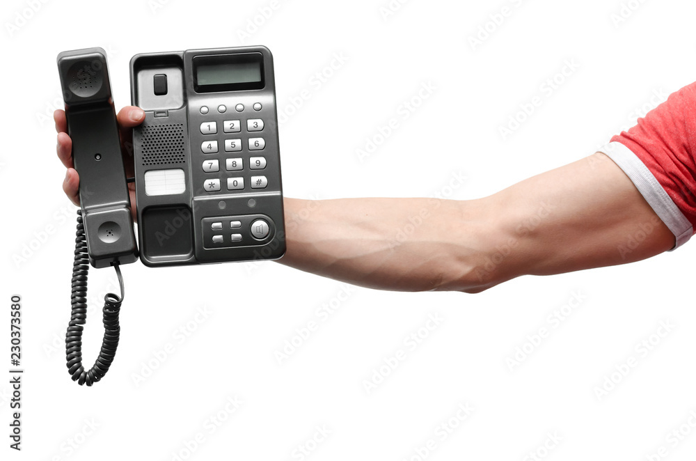 Telephone in the male hand isolated on the white background.
