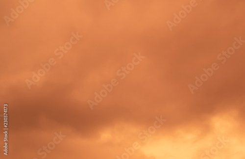 Fiery orange sky before heavy rain.