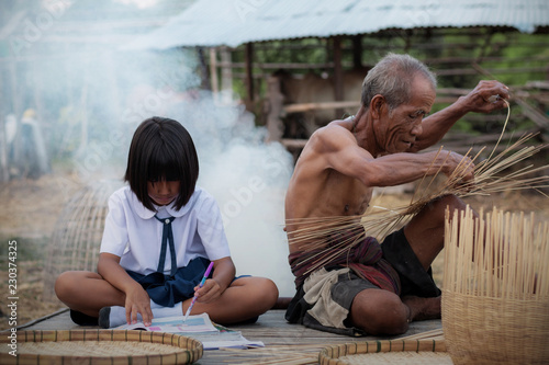 Old people and children in countryside.