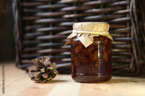 Jam from pine cones of brown color