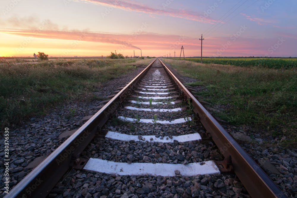 Railway in the steppe / photo right after sunset road leading to the distance Railway in the steppe / photo right after sunset road leading to the distance