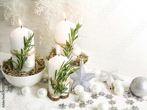 Christmas composition in the Scandinavian style. Candles, natural elements, rustic style.