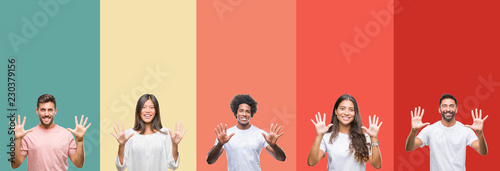 Collage of different ethnics young people over colorful stripes isolated background showing and pointing up with fingers number ten while smiling confident and happy.