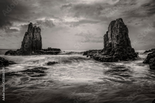 Dramatic skies above coastal sea stacks