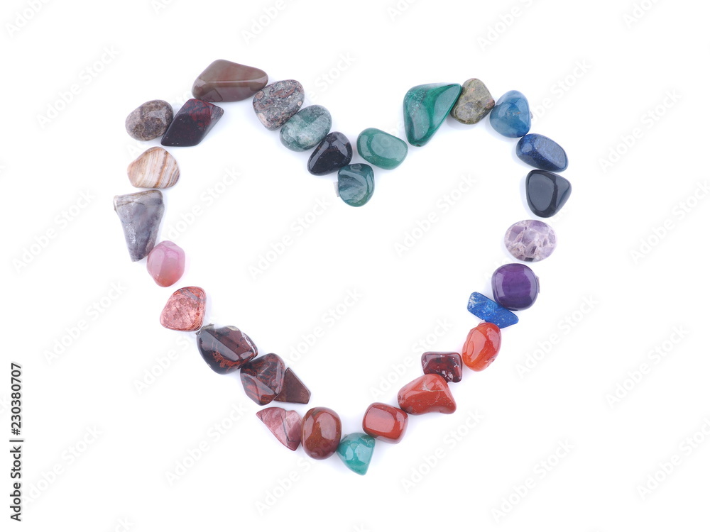 heart of colored stones on a white background heart of colored stones on a white background