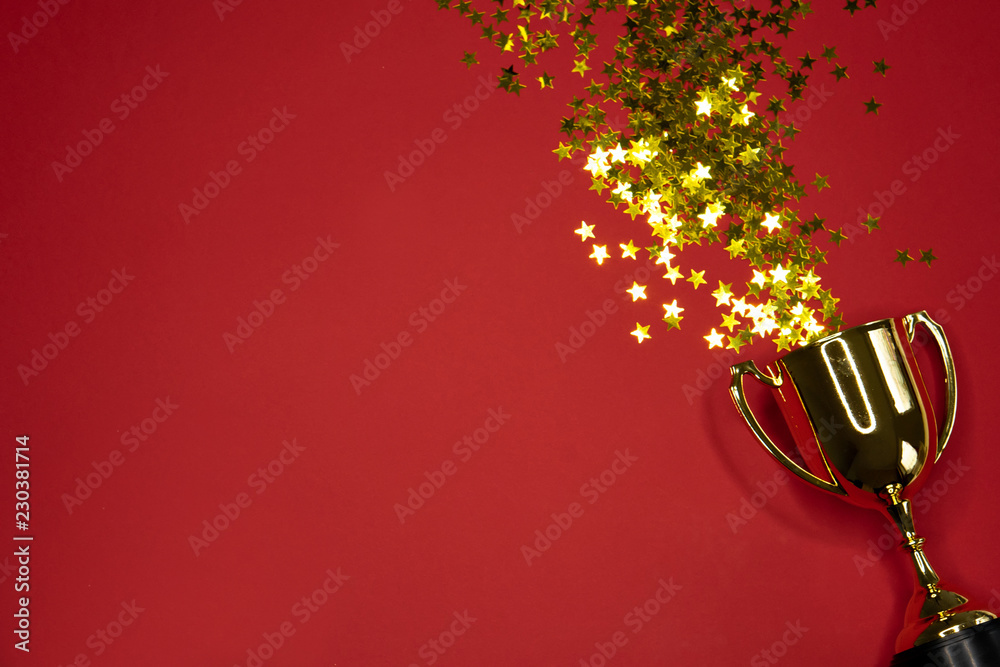 gold winning cup on red background , success concept Stock Photo | Adobe  Stock