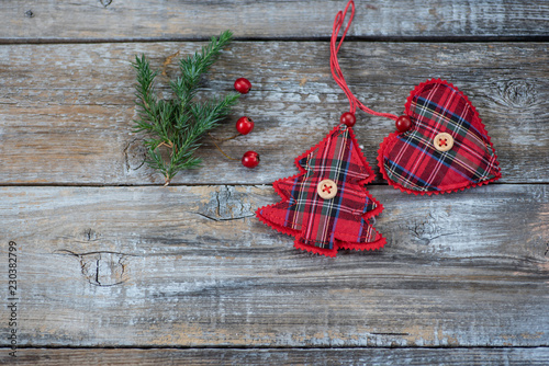 Wooden rustic background with  christmas toys and decorations photo