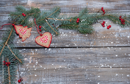 Xmas or New Year background holiday plain composition made of Christmas decorations on a wooden background photo