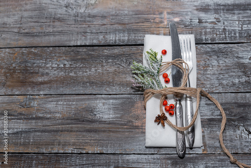 Xmas or New Year background holiday plain composition made of Christmas decorations on a wooden background photo