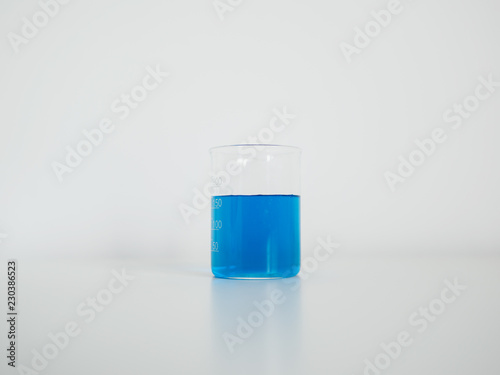 Laboratory beaker on white table