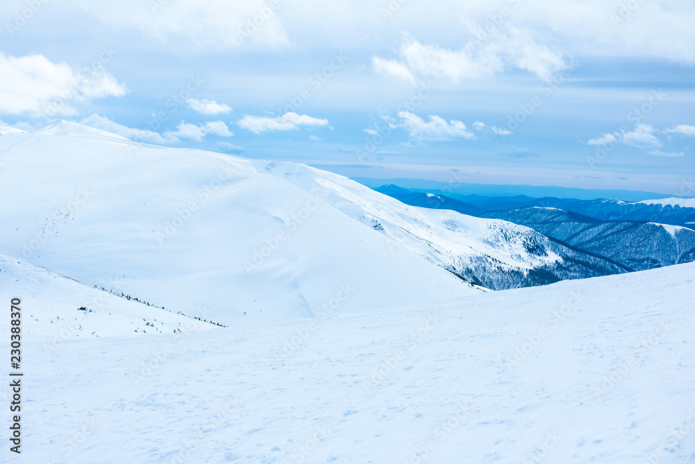 Ukrainian Carpathian mountains in winter. Dragobrat View from the top. Snow drops Winter fairy tale. Traveling