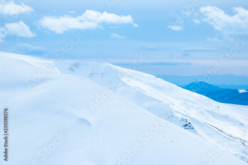 Ukrainian Carpathian mountains in winter. Dragobrat View from the top. Snow drops Winter fairy tale. Traveling