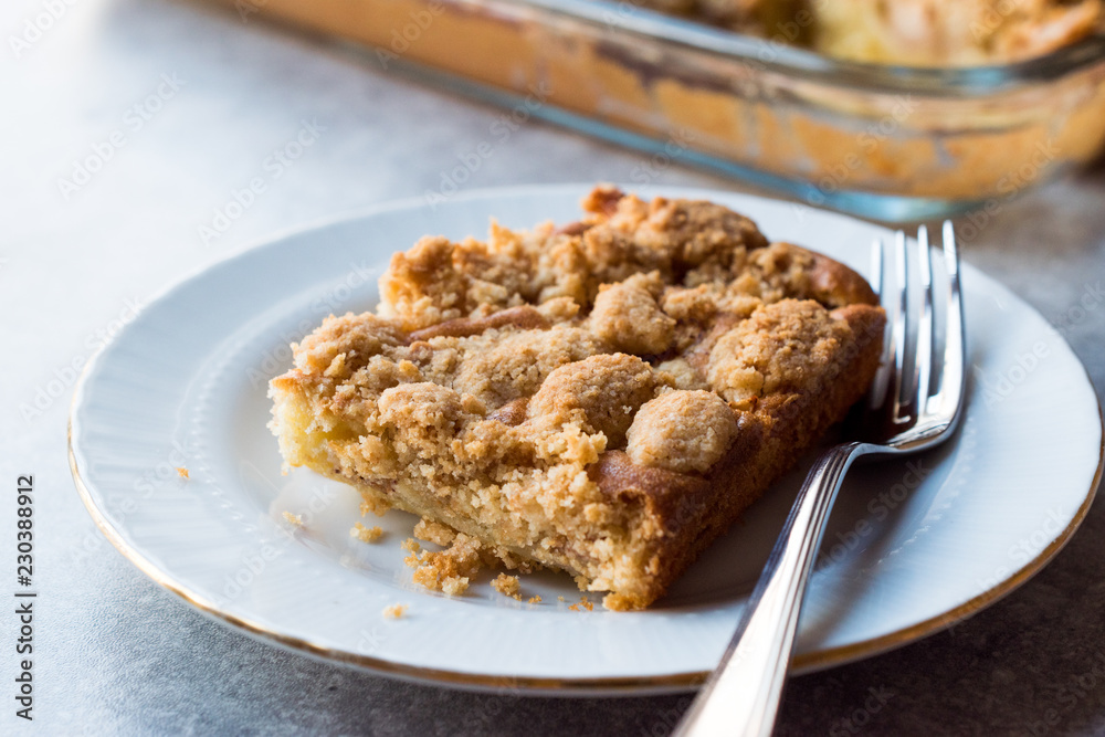 Homemade Apple Crumble Cake Slice with Fork. Homemade Apple Crumble Cake Slice with Fork.