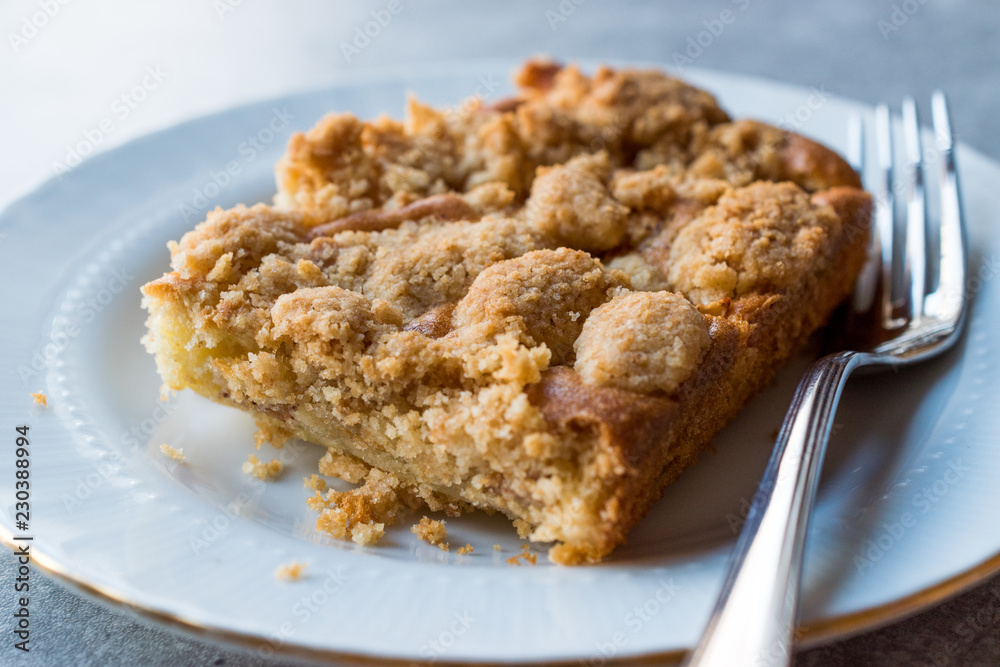 Homemade Apple Crumble Cake Slice with Fork. Homemade Apple Crumble Cake Slice with Fork.
