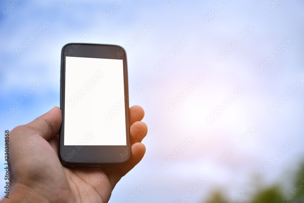 Hand holding smart phone ,mobile phone technology internet online business marketing communication connection mobile app background wireless technology Hand holding smart phone ,mobile phone technology internet online business marketing communication connection mobile app background wireless technology