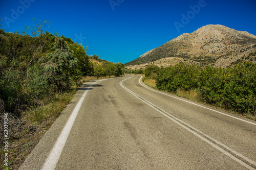 country side road on vivid mountain nature scenic summer landscape
