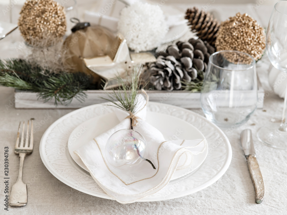 Plate and cutlery near New Year decorations. Plate and cutlery near New Year decorations.