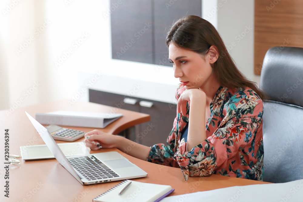 beautiful businesswoman model post thinking with labtop computer beautiful businesswoman model post thinking with labtop computer