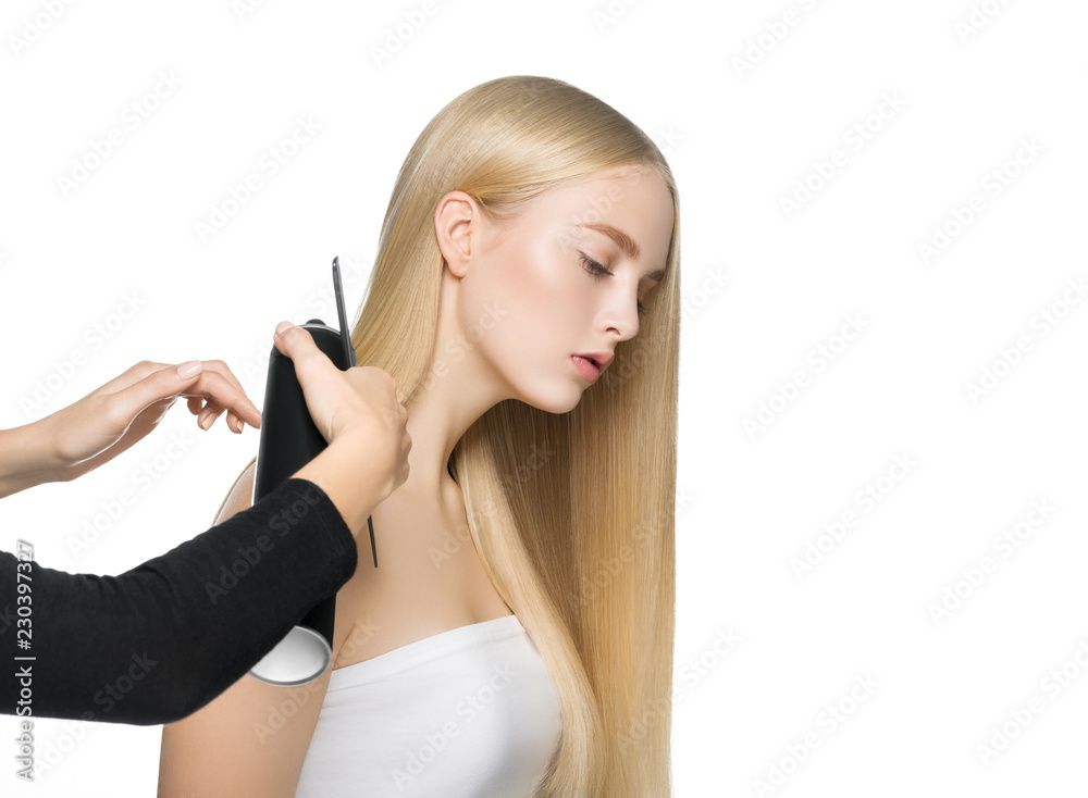 Blonde long hair woman with healthy long hairstyle beauty isolated on white Blonde long hair woman with healthy long hairstyle beauty isolated on white