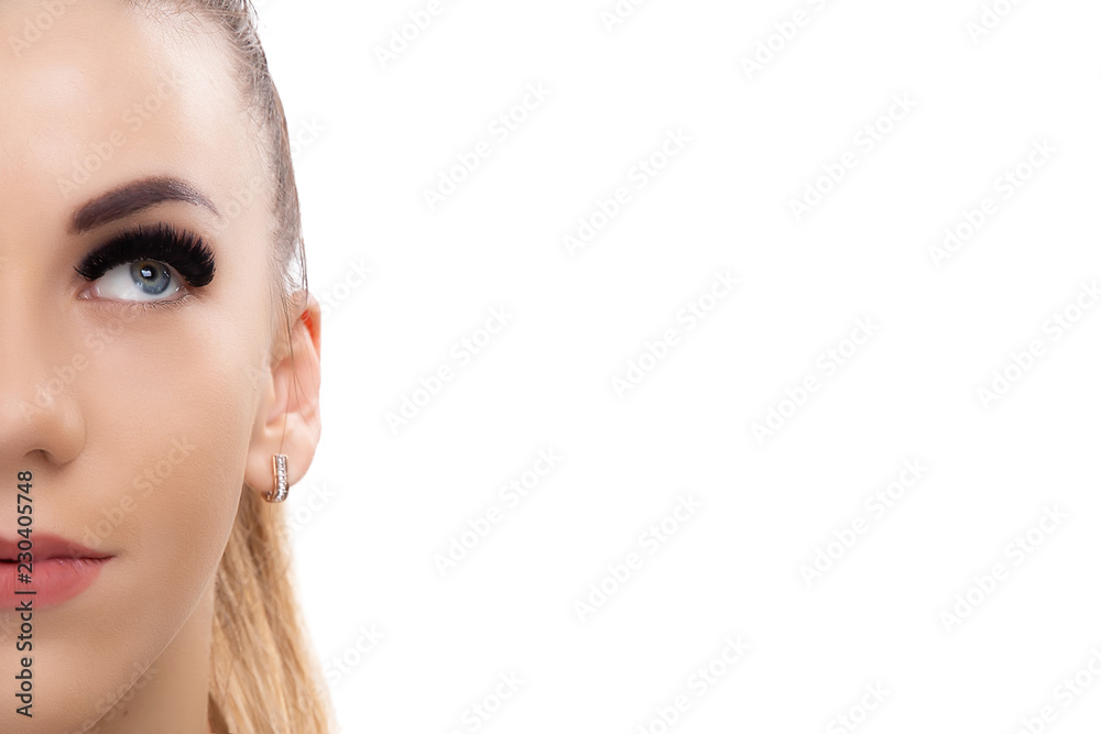 Eyelash Extension Procedure. Woman Eye with Long Eyelashes. Close up, selective focus. Hollywood, russian volume. Copyspace. Eyelash Extension Procedure. Woman Eye with Long Eyelashes. Close up, selective focus. Hollywood, russian volume. Copyspace.