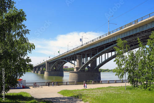 Automobile bridge over the river Ob on a Sunny day in Novosibirsk