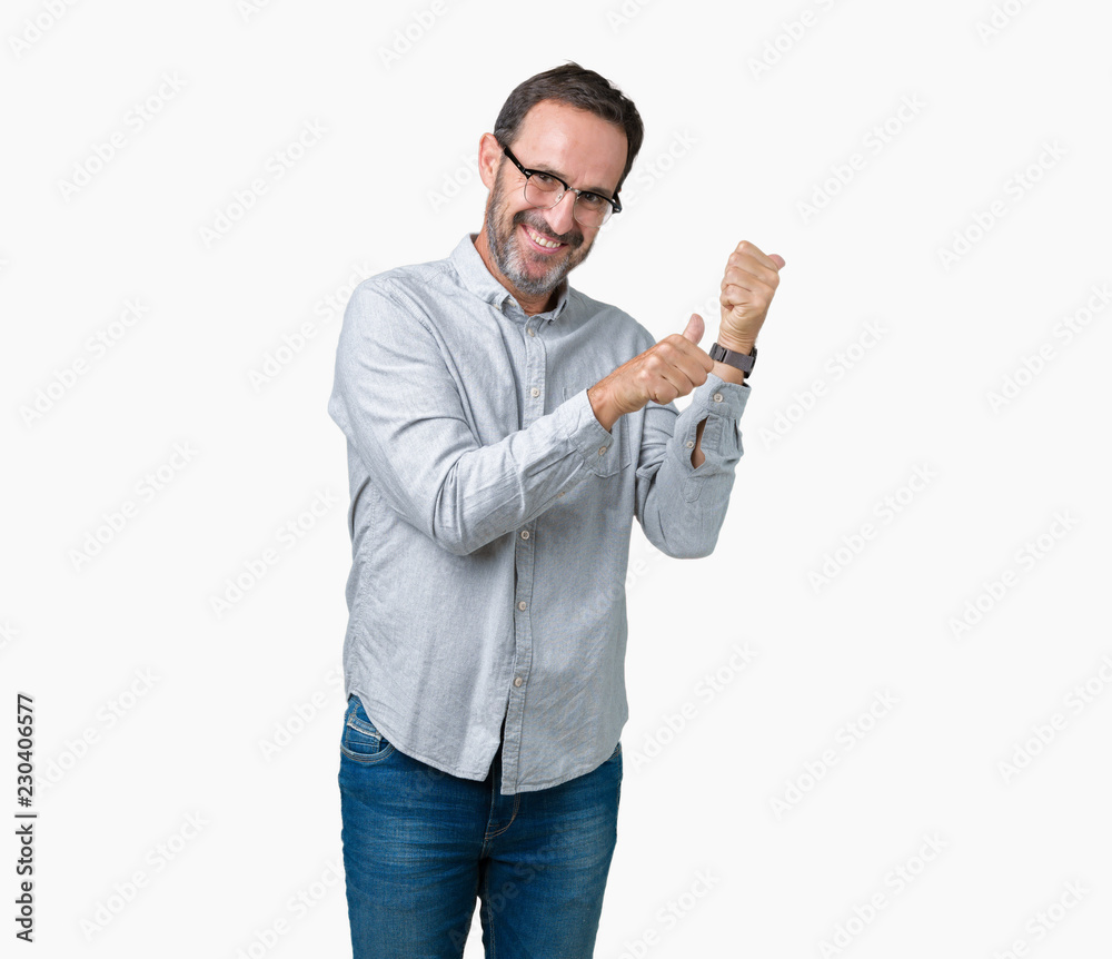Handsome middle age elegant senior man wearing glasses over isolated background Pointing to the back behind with hand and thumbs up, smiling confident Handsome middle age elegant senior man wearing glasses over isolated background Pointing to the back behind with hand and thumbs up, smiling confident