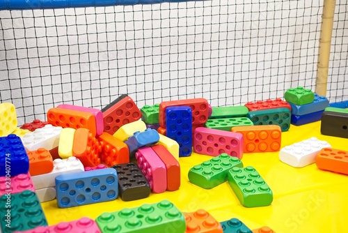 Colorful plastic blocks in indoor chldren playground photo