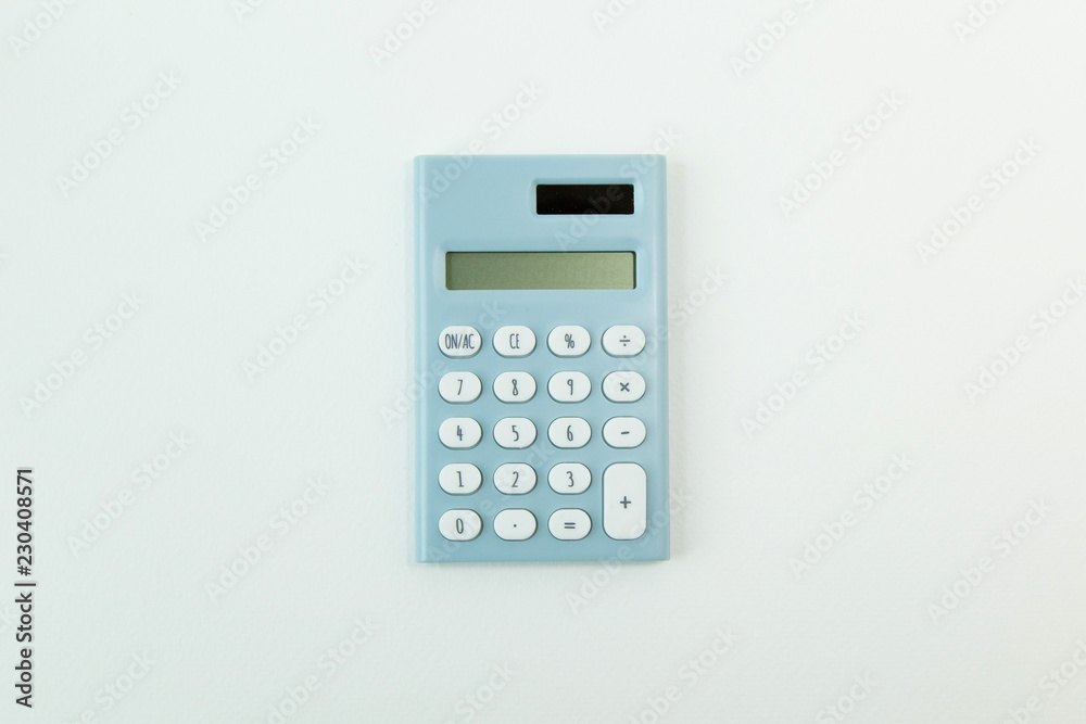blue calculator white background image close up. blue calculator white background image close up.