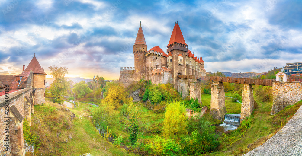 Naklejka premium Beautiful Hunyad Corvin medieval castle in the sunset light, Hunedoara town,Transylvania landamark, Romania,Europe