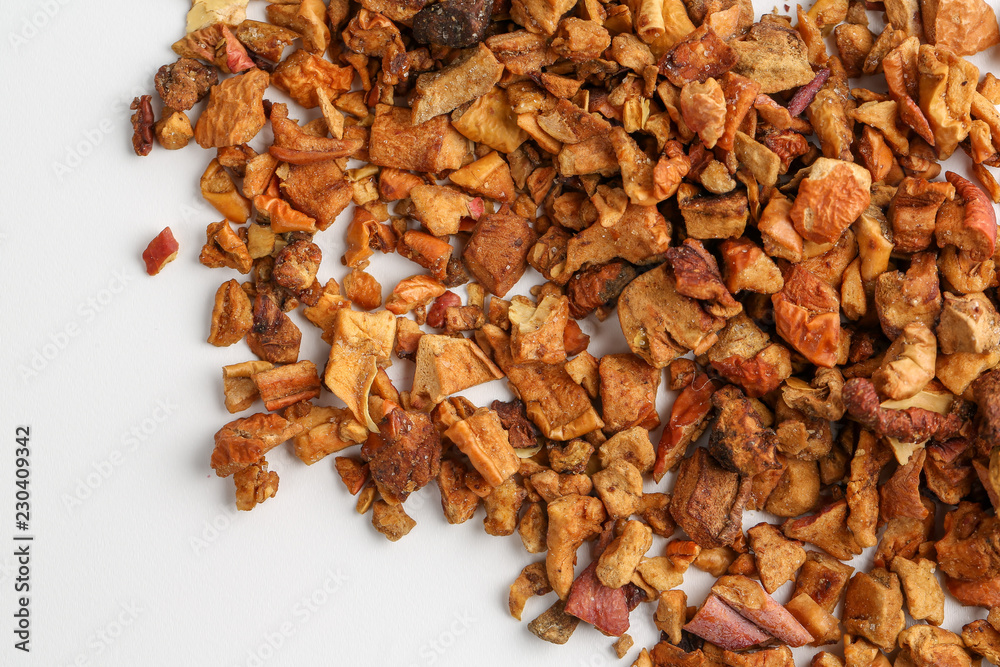 Obraz premium Still life, aromatic dry tea with fruits and petals