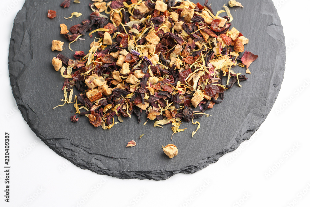 Still life, aromatic dry tea with fruits and petals Still life, aromatic dry tea with fruits and petals