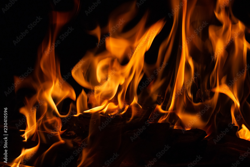 Close up photography of flames on black background Close up photography of flames on black background