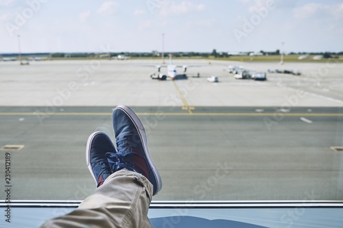 Man waiting at airport photo