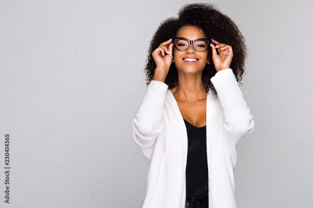 Young woman wearing eyeglasses - obrazy, fototapety, plakaty 