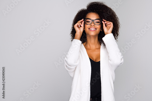 Slika na platnu Young woman wearing eyeglasses