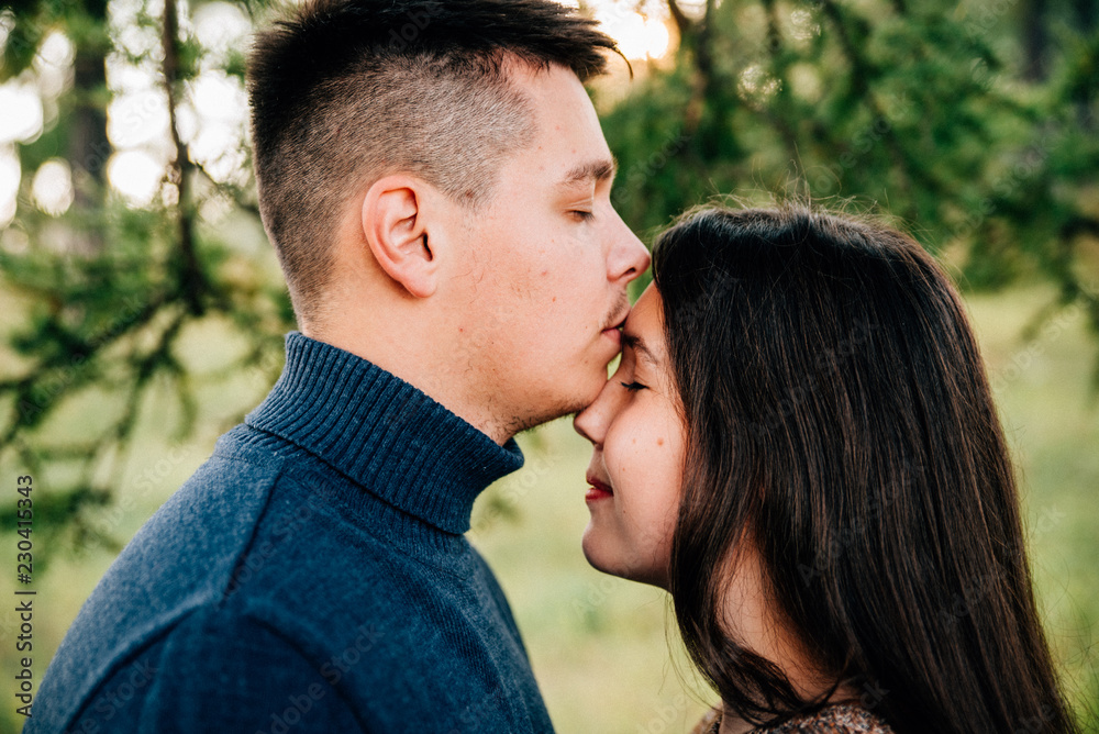photo shoot of a beautiful brunette and her boyfriend in nature photo shoot of a beautiful brunette and her boyfriend in nature