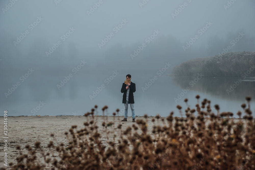 The lonely man walking outsides, where full of mist in morning The lonely man walking outsides, where full of mist in morning