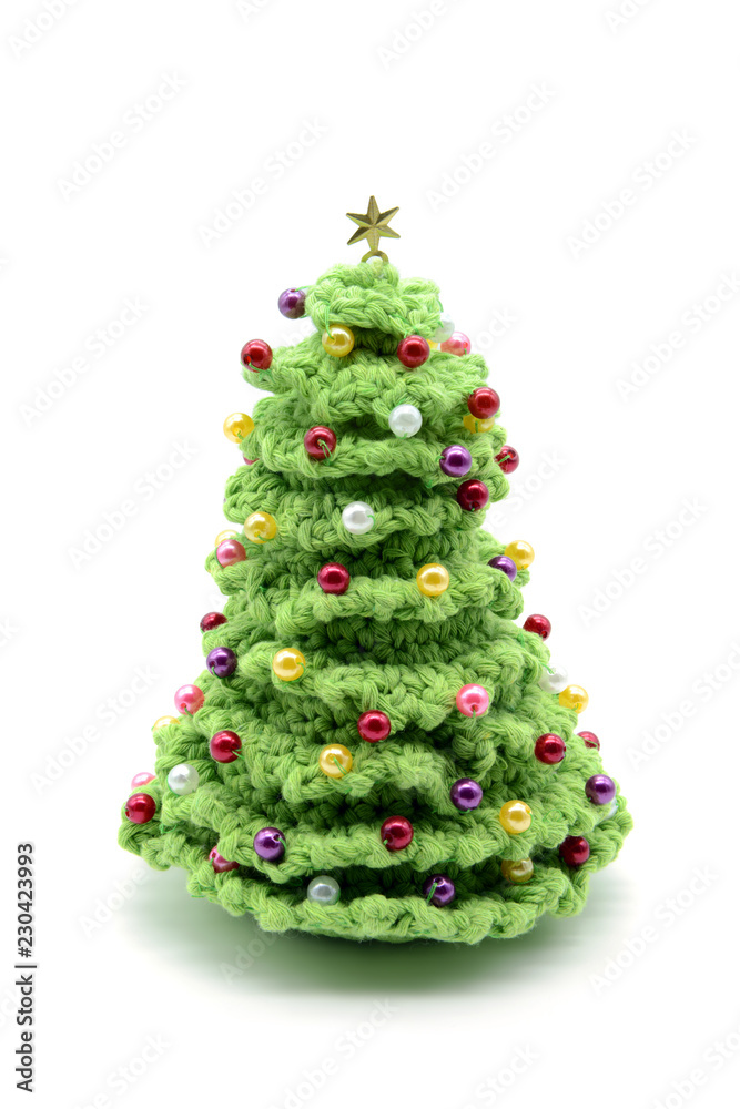 crochet christmas tree with pearls on white isolated background crochet christmas tree with pearls on white isolated background