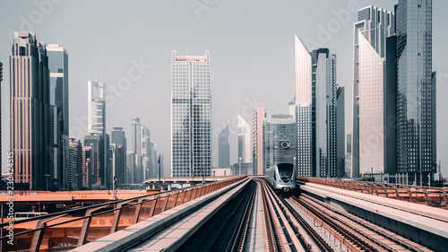 View from first railway carriage. Dubai city skyline panorama. Beautiful urban landscape of UAE in the day