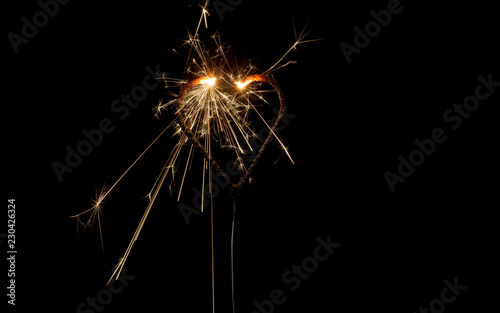 heart sparklers for celebration christmas and happy new year party background 