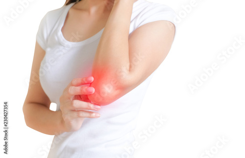 Wallpaper Mural Woman suffering from elbow pain on white background, Healthcare concept. Torontodigital.ca