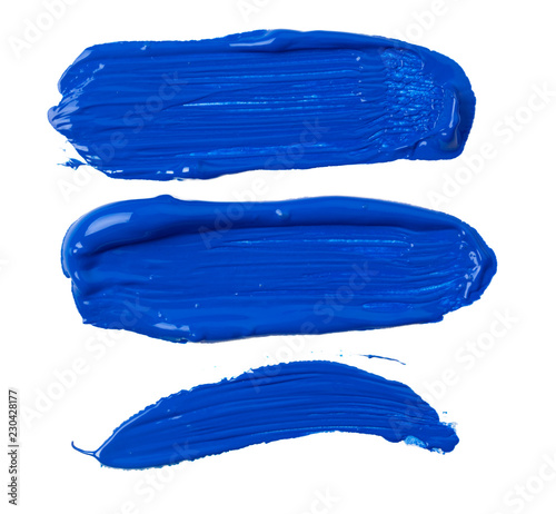 Blue traces of paint isolated on a white background