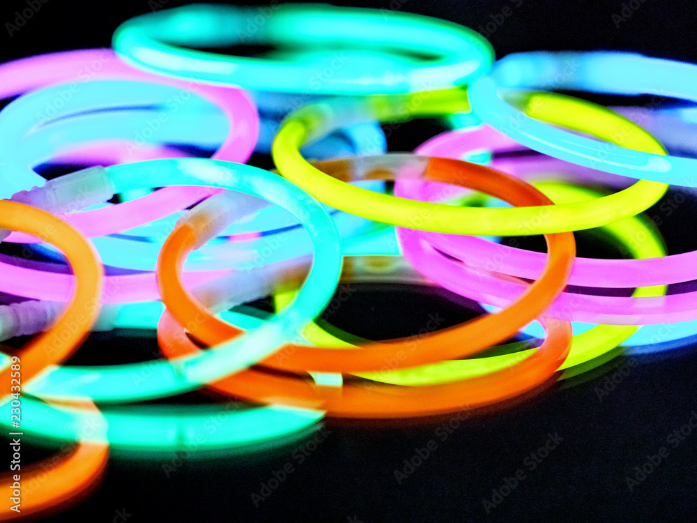 Multicolor fluorescent chem light neon black background